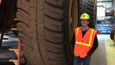 Shaun Usmar inspects a dump truck during a mine site visit scaled e16297526301741721800804