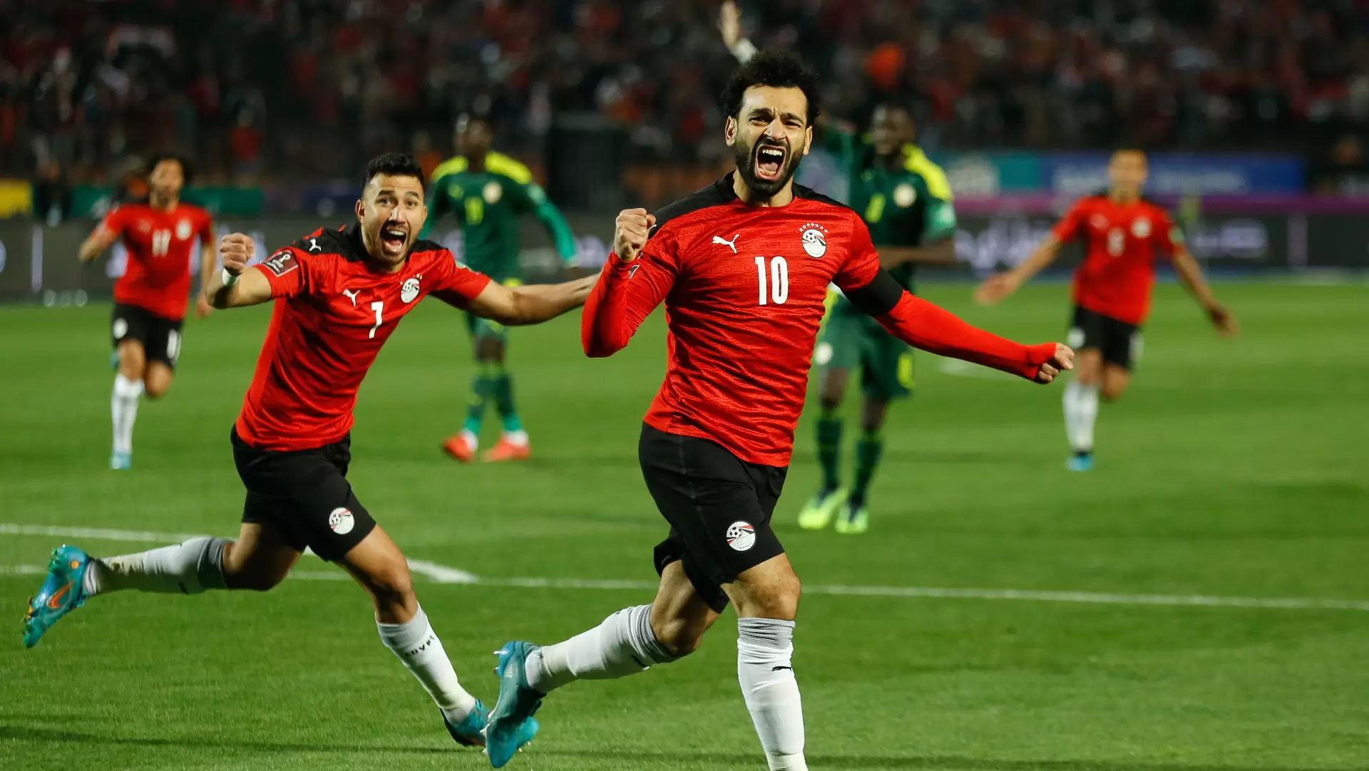 Mohamed Salah Trezeguet of Egypt celebrate vs Senegal1728659462